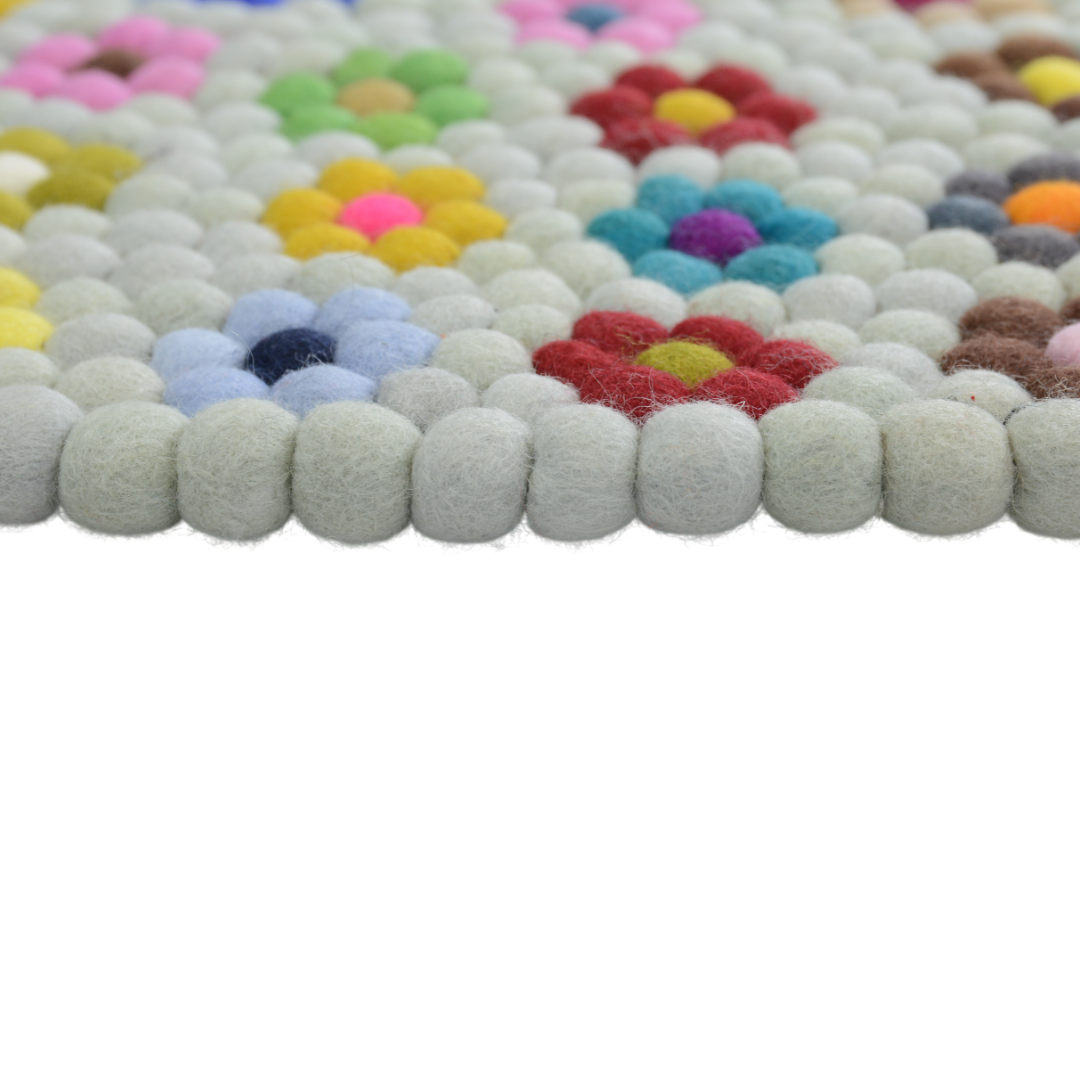 Tapis rond en laine feutrée florale fait main