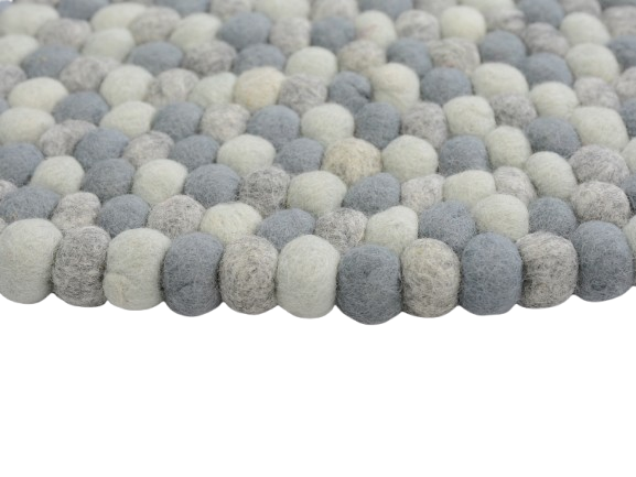 Tappeto rotondo fatto a mano in feltro misto grigio e lana.