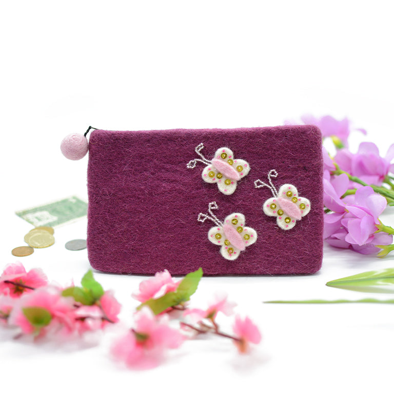 Handtasche aus lila Wollfilz mit weißer Schmetterlingsapplikation