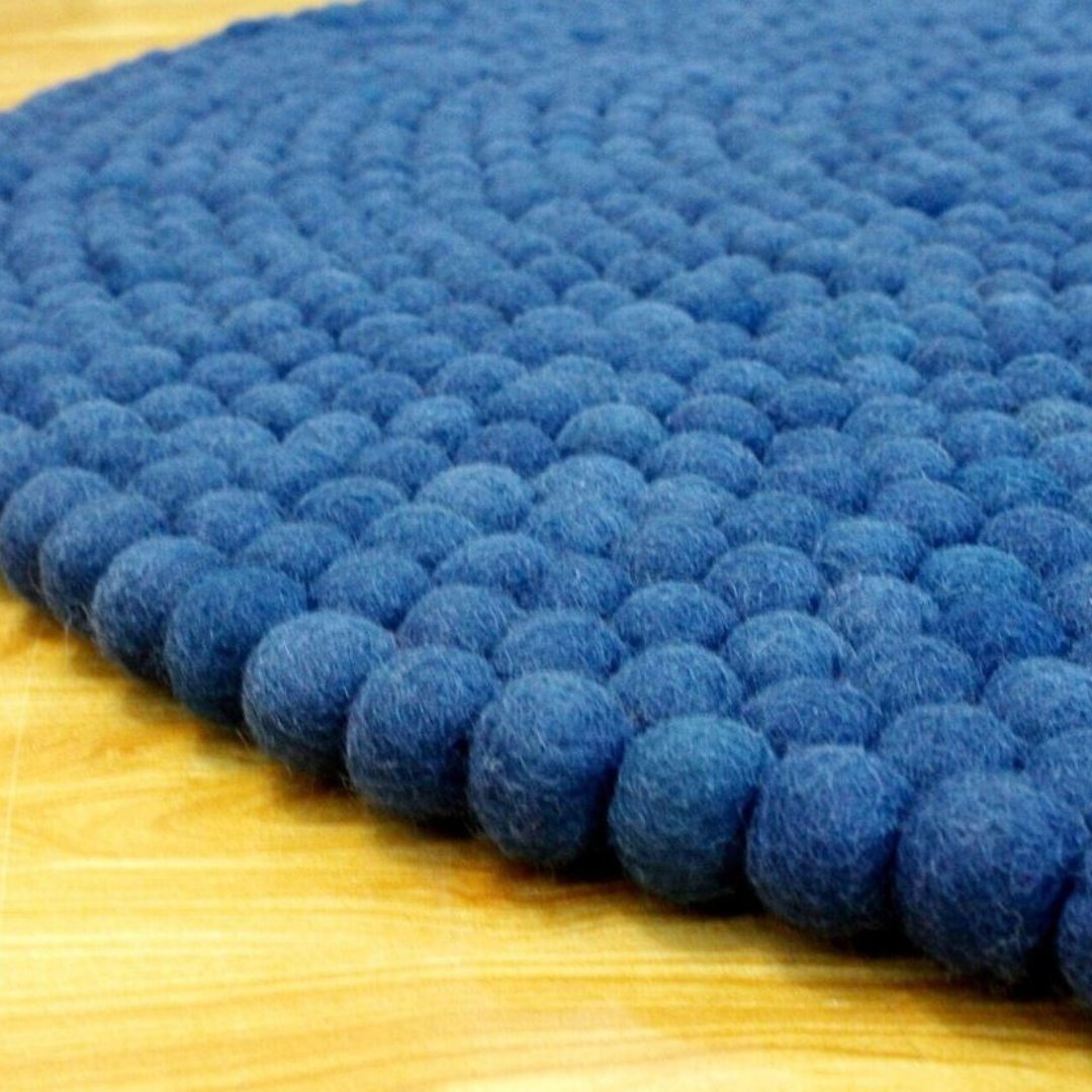 Handgeknüpfter, runder Wollteppich in Marineblau