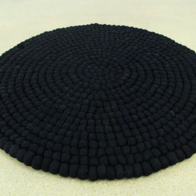 Tapis rond en laine unie noire fait main