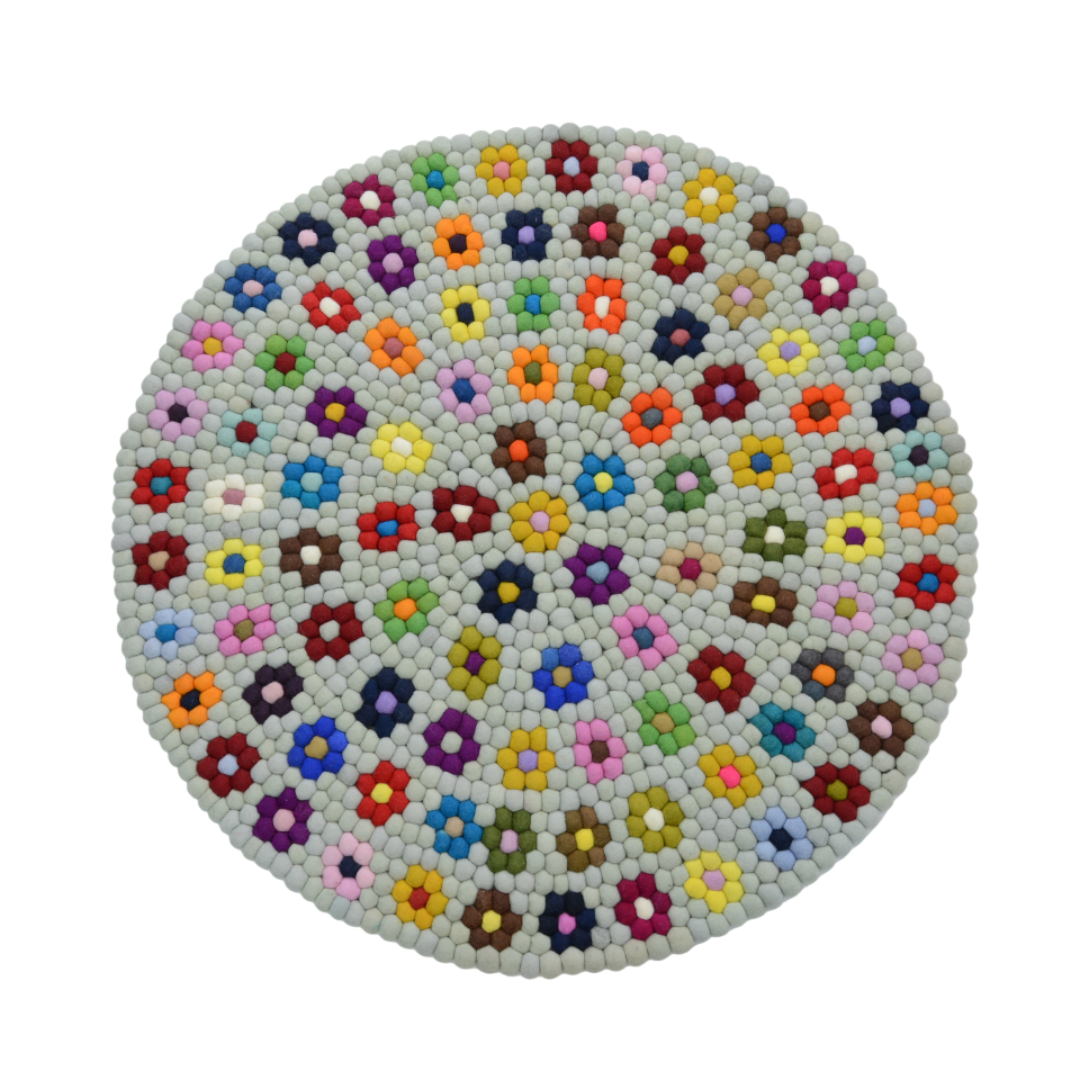 Tapis rond en laine feutrée florale fait main