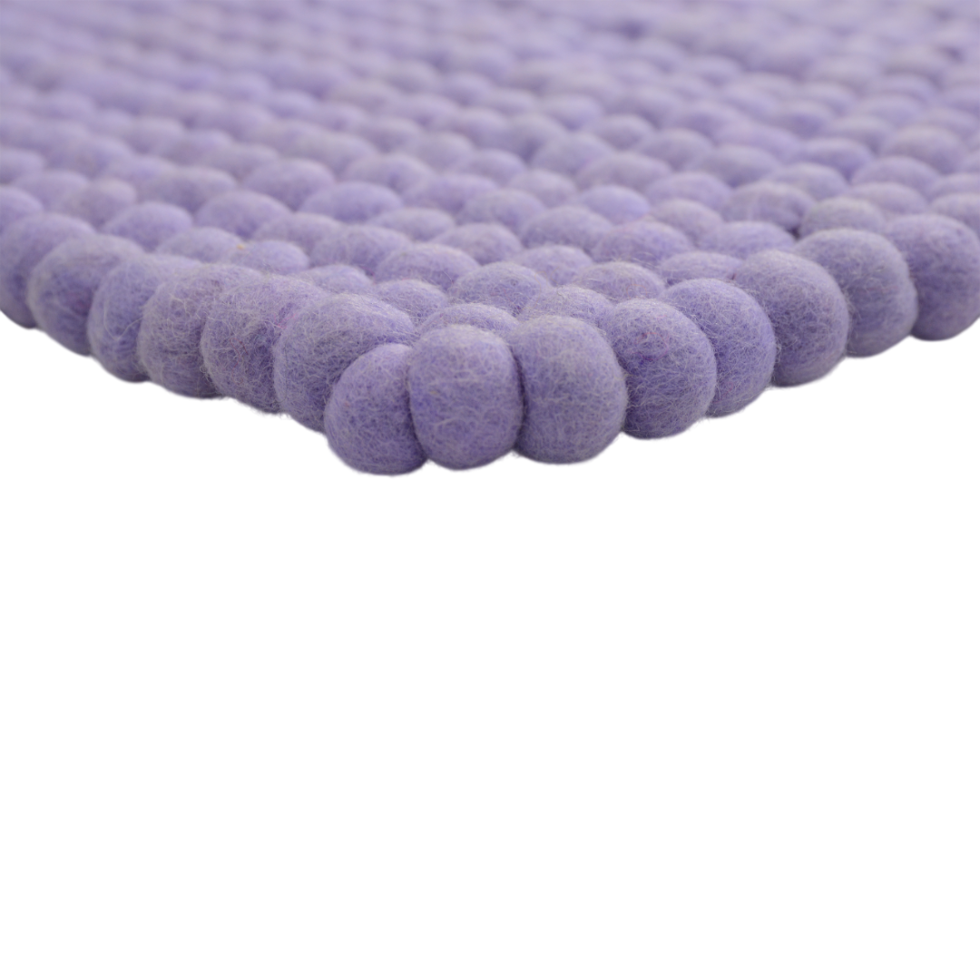 Tappeto rettangolare in lana color lavanda, fatto a mano.