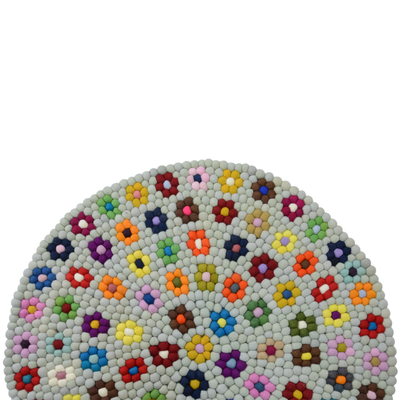 Tapis rond en laine feutrée florale fait main