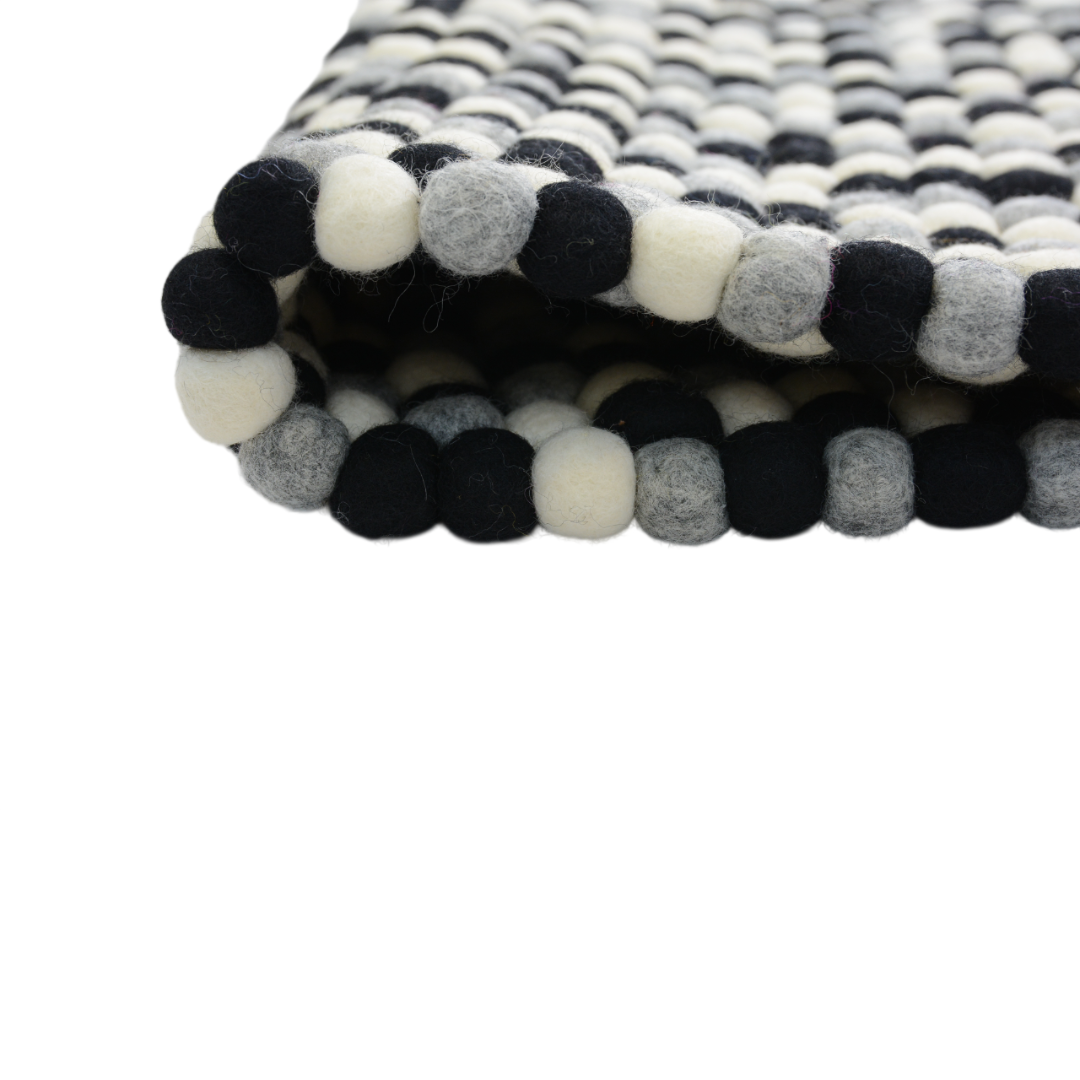 Handgeknüpfter Wollteppich in Schwarz und Weiß