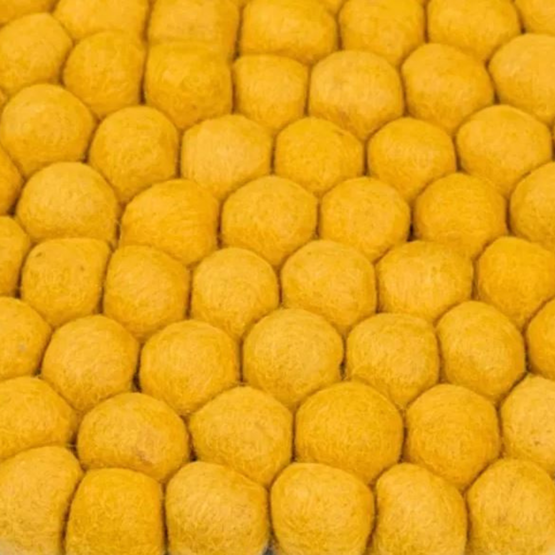 Tapis rond en laine jaune fait main