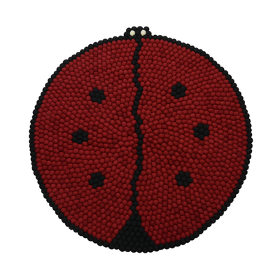 Tappeto rotondo in lana con motivo coccinella, fatto a mano.