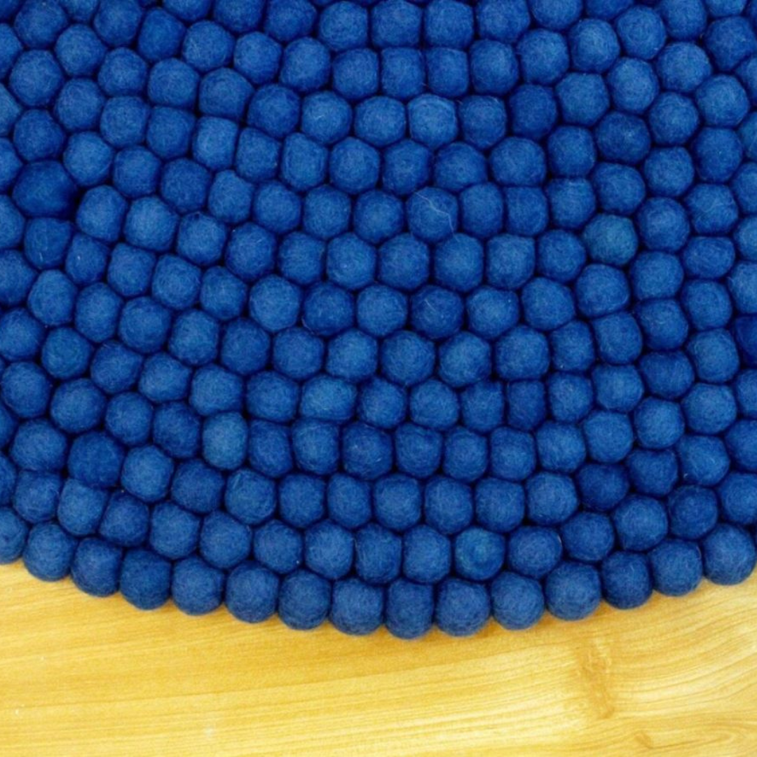 Handgeknüpfter, runder Wollteppich in Marineblau