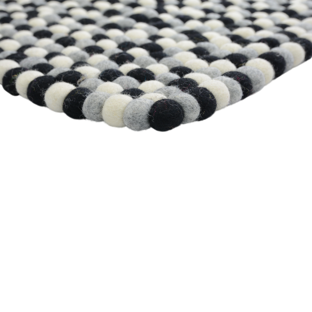 Handgeknüpfter Wollteppich in Schwarz und Weiß