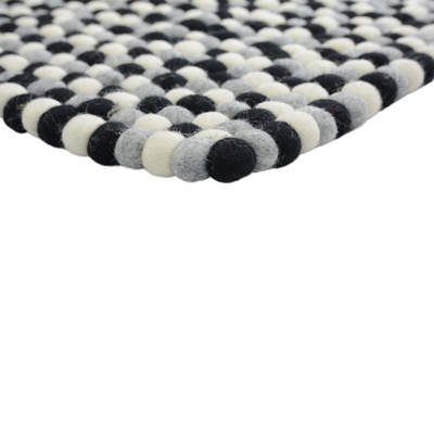 Handgeknüpfter Wollteppich in Schwarz und Weiß