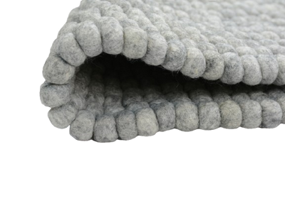 Tapis rond en laine feutrée gris, fait main