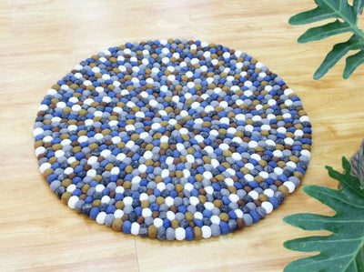 Tapis rond en feutre de laine mélangé bleu-marron fait à la main