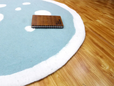 Tapis rond en feutre de laine motif nuage fait main pour chambre d'enfant